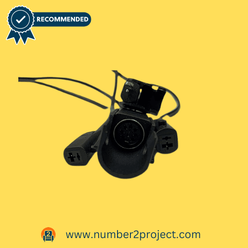 An overhead view of a recliner chair's power supply connector, showcasing a Y-split design with multiple plug-ins.